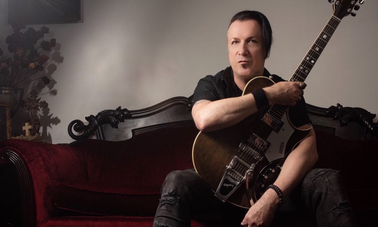 Mark Gemini Thwaite - Portrait with Gretsch guitar